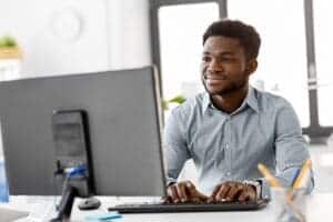 happy business owner with lower credit card processing costs