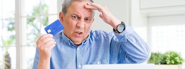 man frustrated with online payment