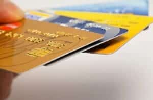Credit card stack images used in IntelliPay blog post Differences between PSPs (Stripe) and Marchant accounts