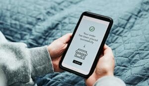 Small business online order made on a mobile phone - Small businesses are falling down on millennials and Gen Zers