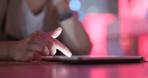 Resident using tablet to read a local government blog