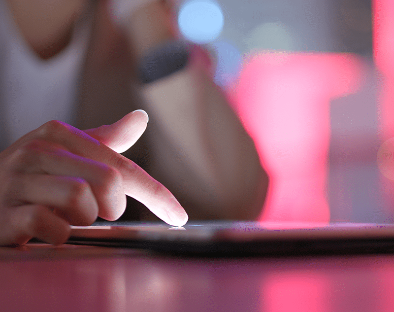 Resident using tablet to read a local government blog