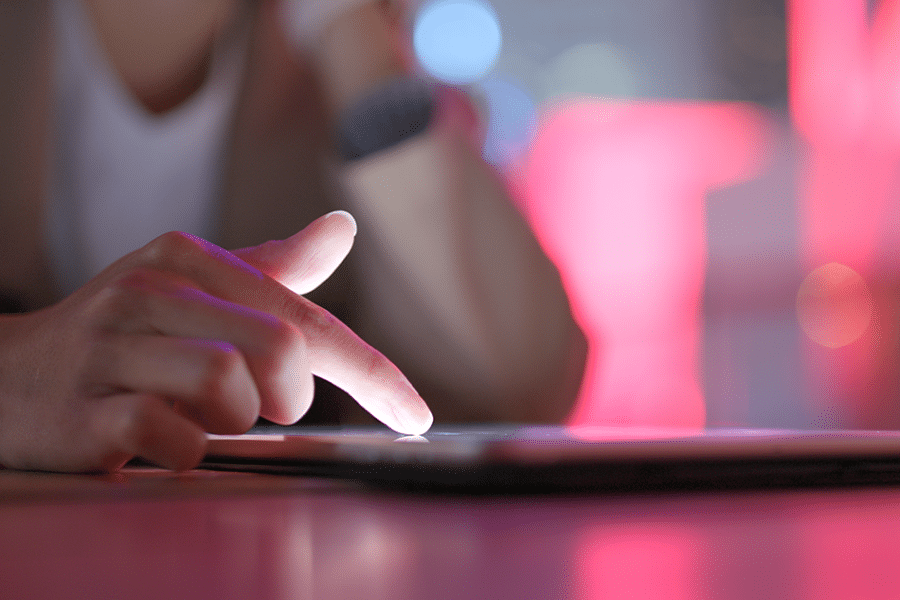 Resident using tablet to read a local government blog