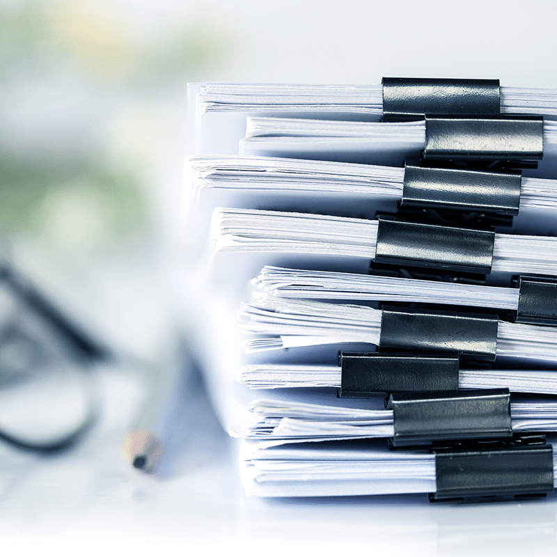 pile of paperfroms - 10 most common manual processes blog post