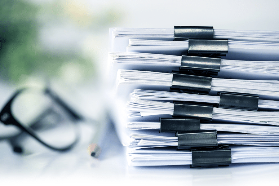 pile of paperfroms - 10 most common manual processes blog post