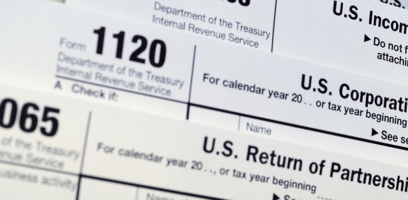 corporate tax forms image for IntelliPay blog post on are Payment Processing Fees and Tax Deductions What are Payment Processing Fees? Payment processing fees are the charges businesses incur for using services that facilitate transactions with customers. These services enable businesses to accept various electronic payment methods, including credit and debit cards, digital wallets, and mobile payments. These fees typically consist of: • Interchange Fees: Charged by issuing banks, these are usually the largest portion of payment processing fees. Card networks set these fees, and they are generally non-negotiable. • Assessment Fees: Charged by card networks, these fees are smaller than interchange fees but also typically non-negotiable. • Processor Markup: This is the fee charged by the payment processor for handling card transactions. It is often negotiable and varies among processors. • Additional Fees: Some processors charge extra for services like chargeback handling, payment gateway access, or PCI compliance. These fees depend on factors like transaction type (in-person vs. online) and card type (debit vs. credit, rewards vs. non-rewards). Are Payment Processing Fees Tax-Deductible? Generally, payment processing fees are considered a necessary business expense and are tax-deductible in the United States. This includes fees for credit card transactions, online payment platforms, and bank fees related to business transactions. According to IRS Publication 535, deductible business expenses must be both ordinary and necessary: • Ordinary Expense: Common and accepted in your trade or business. • Necessary Expense: Helpful and appropriate for your trade or business. Payment processing fees meet these criteria because they are a standard cost of doing business. Sole proprietors typically report these fees under "bank fees" or a similar category on Schedule C (Form 1040), Profit or Loss from Business. Corporations, partnerships, and other business entities will have corresponding sections on their tax returns. Transaction Fees and Merchant Fees: Tax-Deductible? • Transaction Fees: Transaction fees charged by payment processors are generally tax-deductible as they are ordinary and necessary expenses directly related to business operations. • Merchant Fees: Similarly, merchant fees are also typically tax-deductible. When you accept credit card payments, the fees charged by the payment processor or merchant services provider can be deducted, reducing your taxable income. To accurately deduct these fees, maintain detailed records, including invoices, receipts, and statements from your payment processor. This documentation will support your deductions during tax filings. Best Practices for Deducting Payment Processing Fees Follow these best practices to ensure a smooth tax season: • Accurate Recordkeeping: Keep all invoices, receipts, and supporting documents to substantiate your deductions. • Separate Business and Personal Expenses: Clearly differentiate between business and personal expenses related to payment processing. Only deduct fees directly associated with your business. • Correctly Classify Expenses: Use the appropriate tax forms and categories when reporting payment processing fees (e.g., "bank fees" on Schedule C for sole proprietors). • Consult a Tax Professional: Seek advice from a qualified tax professional or accountant specializing in business taxes for personalized guidance and to ensure compliance with tax regulations. • Stay Informed: Keep up-to-date with the latest tax regulations and guidelines to stay informed about changes that may affect the deductibility of payment processing fees. Disclaimer: This information is for general guidance only and not financial or legal advice. Consult with a qualified professional for advice tailored to your specific situation. Are payment processing fees tax deductible?