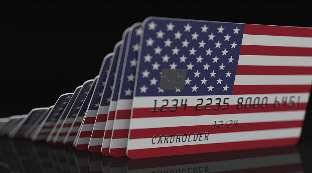 flag theme credit cards falling - IntelliPay blog post image falling use of credit cards