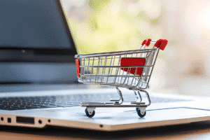 abandoned cart sitting on a laptop for intellipay blog post on Reduce Cart Abandonment, Boost Conversions