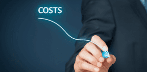 A business professional drawing a downward arrow under the glowing word "COSTS," symbolizing credit card fee reduction and interchange optimization for small businesses
